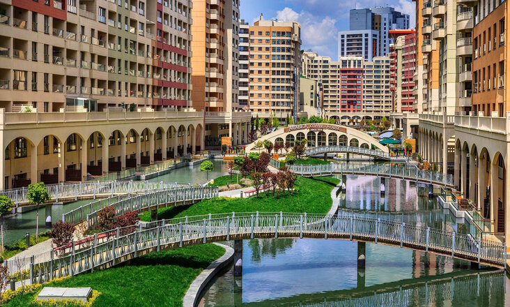 Artificial lagoon landscape with Balena system in Altin Oran with bridges and residential buildings