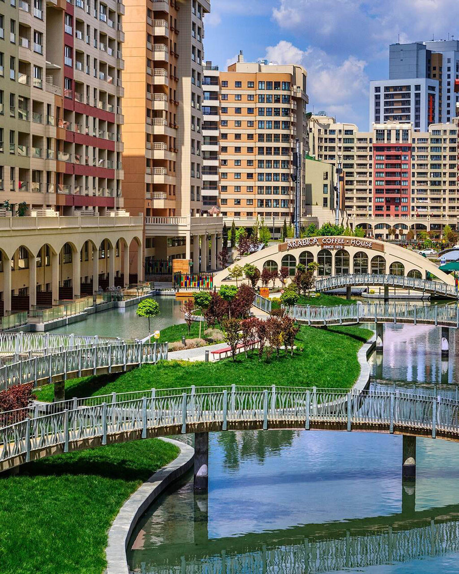 Artificial lagoon landscape with Balena system in Altin Oran with bridges and residential buildings