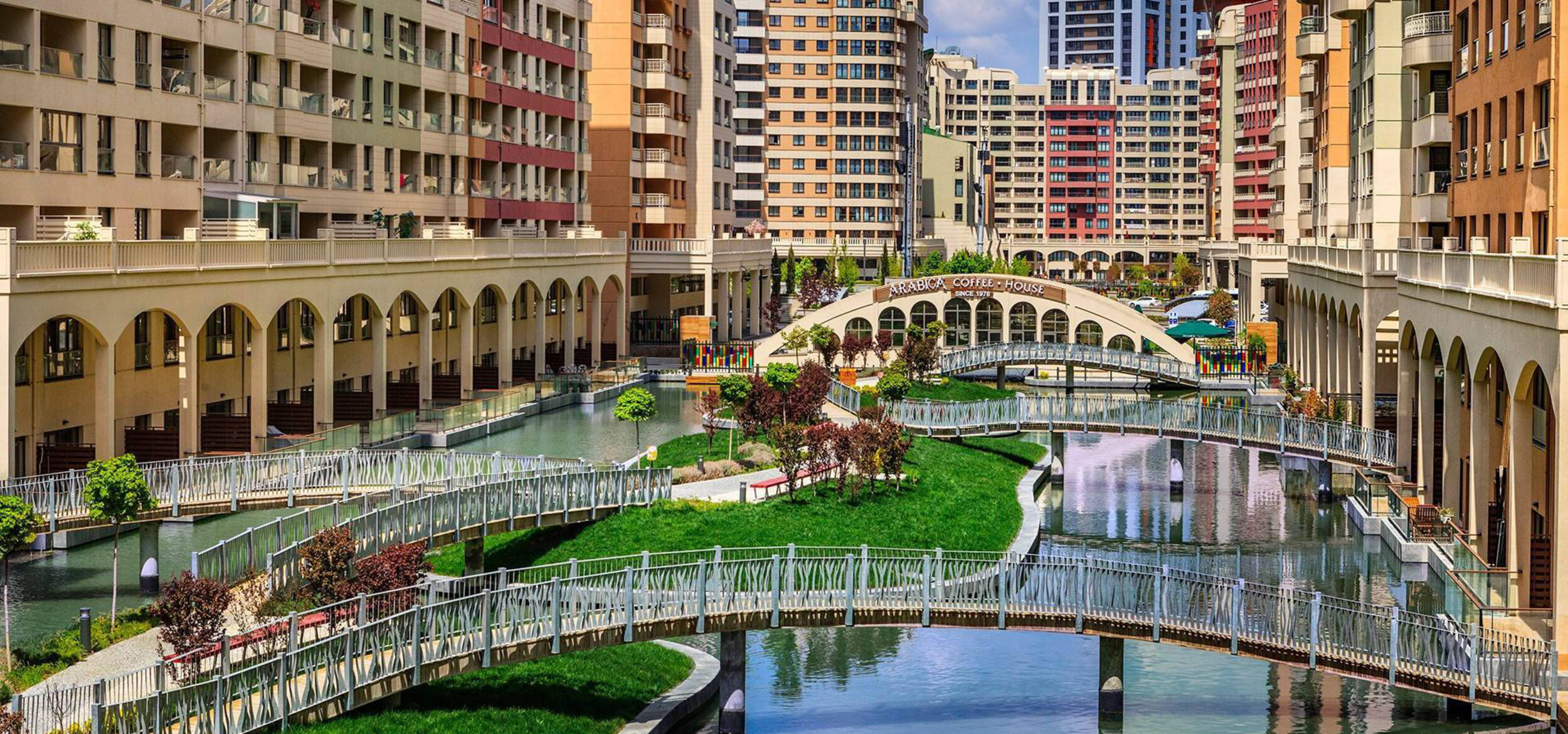 Artificial lagoon landscape with Balena system in Altin Oran with bridges and residential buildings