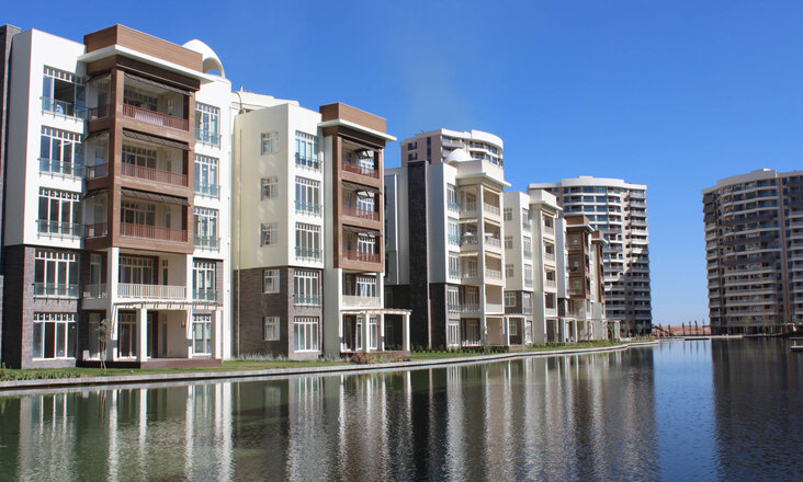 The Balena lagoon landscape in the “Antepia” villa complex in Gaziantep, Turkey, with modern houses on the shore