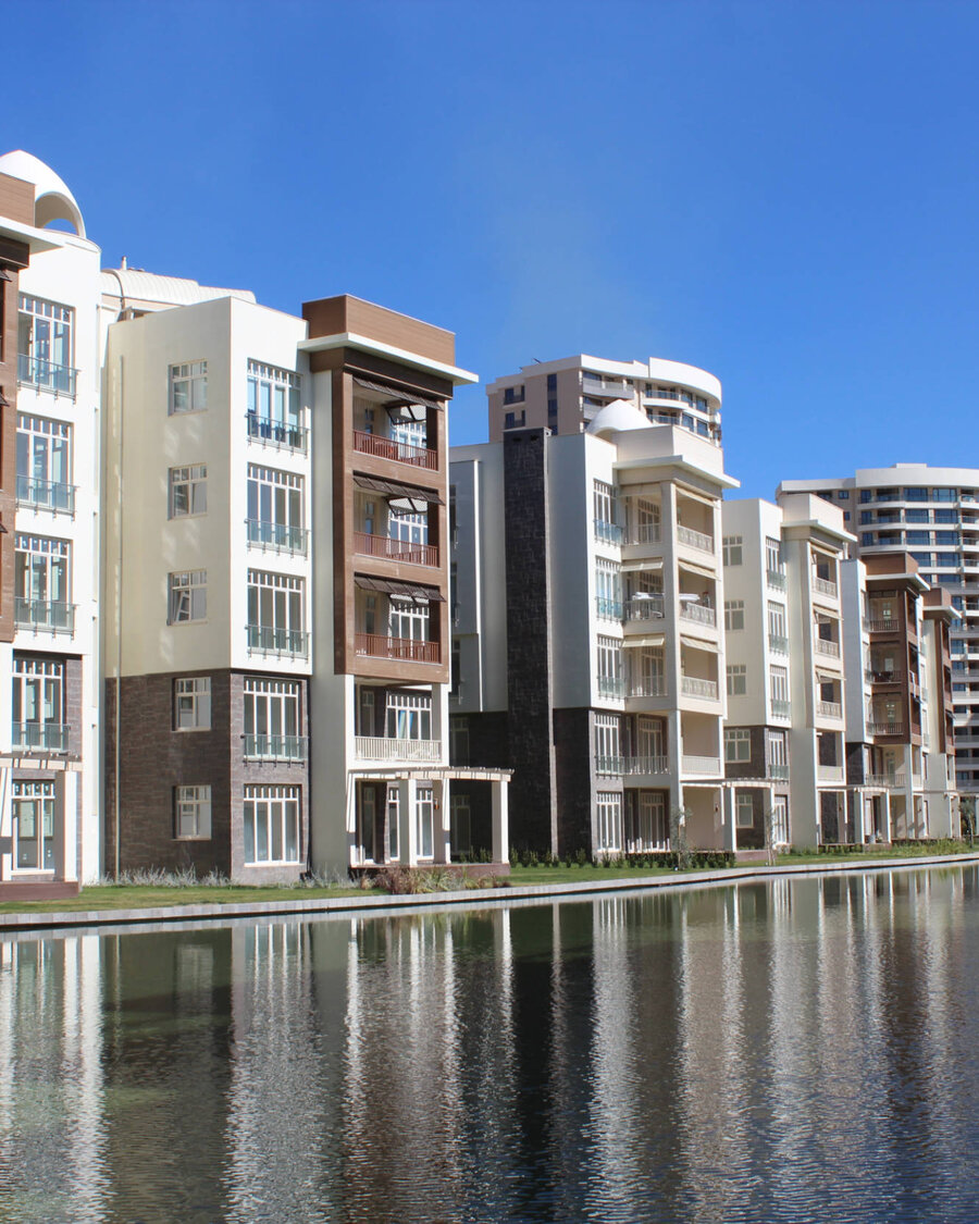 The Balena lagoon landscape in the “Antepia” villa complex in Gaziantep, Turkey, with modern houses on the shore